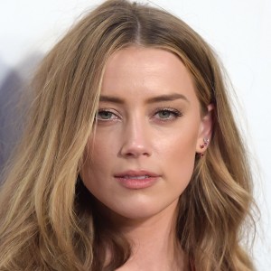 Amber Heard Is Happy To Be Moving Forward - ZergNet