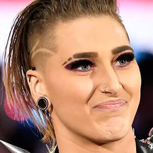 WWE's Rhea Ripley Blasts Fans After Airport Incident - ZergNet